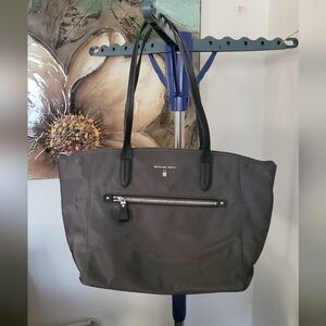 Michael Kors Kelsey medium nylon tote bag in grey/graphite with black straps.